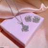 Cross/Check Pendant Set